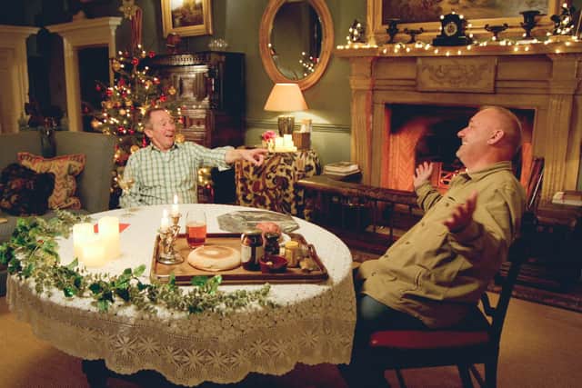 Bob Mortimer and Paul Whitehouse sat around a Christmas table (Credit: BBC/Owl Power)