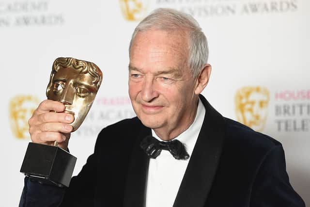 Jon Snow poses with the award for Best News Coverage for the Paris Massacre (Photo: Stuart C. Wilson/Getty Images)