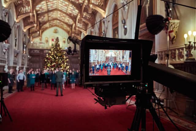 The Singology Community Choir recording a segment for The Queen’s Christmas Broadcast inside St George’s Hall in Windsor Castle