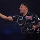 Defending champion Gerwyn Price takes on Belgium’s Kim Huybrechts in the Third Round after winning his opening match against Richie Edhouse