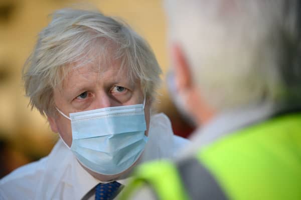 Boris Johnson will be presented with Omicron data from over Christmas ahead of making a decision on whether new measures will be introduced for England. (Credit: Getty)