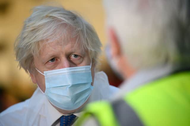 Boris Johnson will be presented with Omicron data from over Christmas ahead of making a decision on whether new measures will be introduced for England. (Credit: Getty)