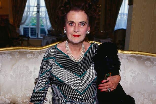 The Duchess of Argyll wearing her signature three-string pearl necklace 