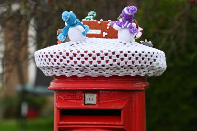 This Royal Mail postbox got into the festive spirit as deliveries wound down after the Christmas rush