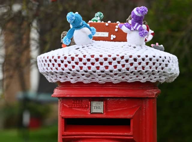 This Royal Mail postbox got into the festive spirit as deliveries wound down after the Christmas rush