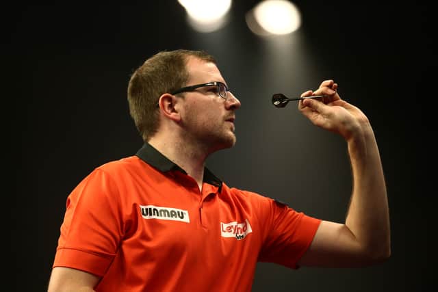 Mark Webster of Wales in action during his second round match against Phil Taylor of England on Day Eight of the William Hill PDC World Darts Championships at Alexandra Palace on December 28, 2014