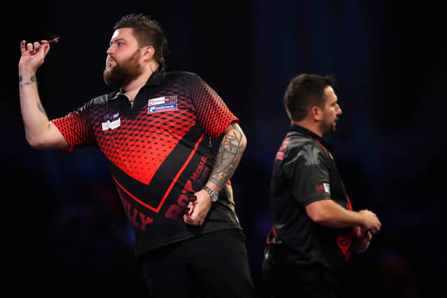 Michael Smith of Englands in action during his Fourth Round Match against Jonny Clayton of Wales during Day Twelve of The William Hill World Darts Championship at Alexandra Palace on December 29, 2021