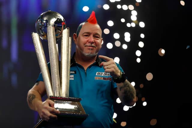 Peter Wright of Scotland celebrates the win during the Finals against Michael Smith of England during Day Sixteen of The William Hill World Darts Championship at Alexandra Palace on January 03, 2022 in London, England