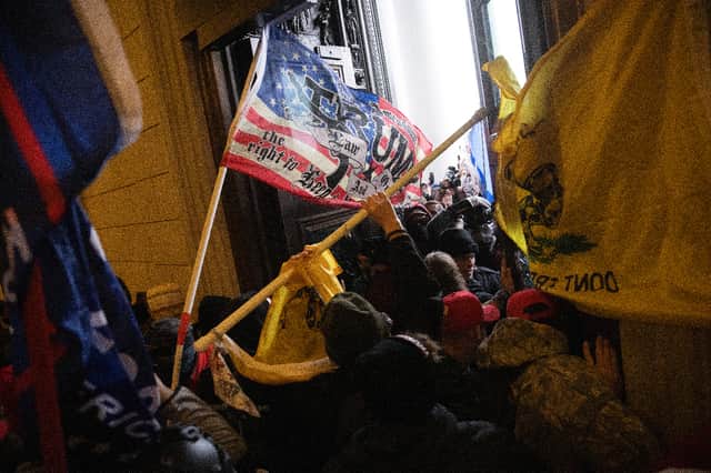 <p>A pro-Trump mob breaks into the U.S. Capitol on 6 January 2021 in Washington. (Pic: Getty)</p>