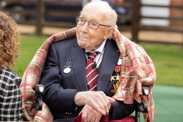 Captain Sir Tom Moore and his daughter Hannah celebrate his 100th birthday, with an RAF flypast provided by a Spitfire and a Hurricane over his home on April 30, 2020 (Photo: Emma Sohl - Capture the Light Photography via Getty Images)