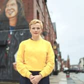 Maxine Peake standing in front of the Anne Williams mural (Credit: ITV/Amy Brammall)