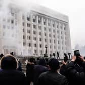 Protesters storm in the city hall of Kazakhstan’s largest city Almaty on January 5 - as unprecedented unrest in the Central Asian nation spins out of control due to a hike in energy prices (image: AFPTV/AFP via Getty Images)