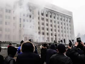 Protesters storm in the city hall of Kazakhstan’s largest city Almaty on January 5 - as unprecedented unrest in the Central Asian nation spins out of control due to a hike in energy prices (image: AFPTV/AFP via Getty Images)