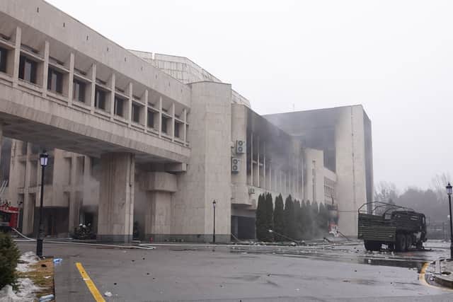 A picture taken on January 7, 2022 shows a burnt-out administrative building in central Almaty, after violence that erupted following protests over hikes in fuel prices. -(Photo by ABDUAZIZ MADYAROV/AFP via Getty Images)