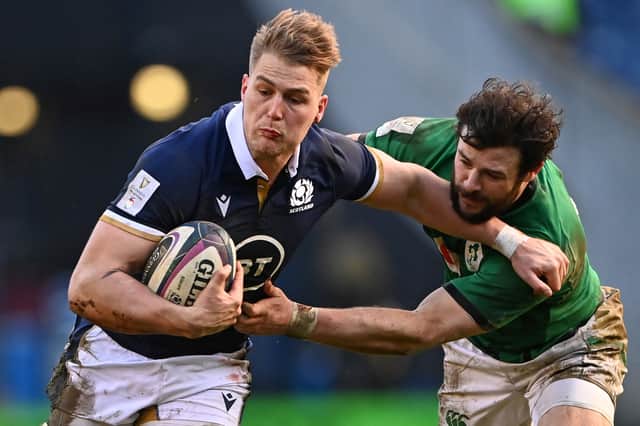 cotland's wing Duhan van der Merwe (L) is tackled by Ireland's centre Robbie Henshaw (R) during the Six Nations international rugby union match between Scotland and Ireland at Murrayfield Stadium in Edinburgh on March 14, 2021