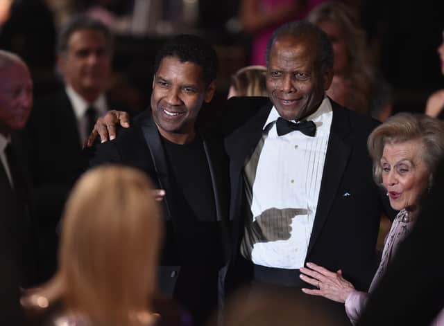 <p>Sir Sydney Poitier with Denzel Washington (left) at the 2016 Carousel Of Hope Ball at The Beverly Hilton Hotel (Photo: Getty)</p>