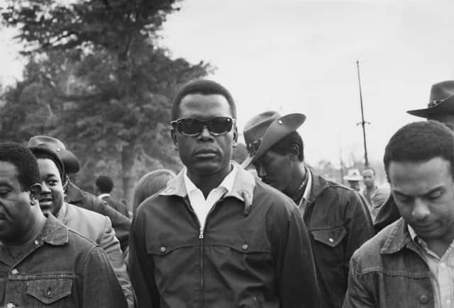 Sidney Poitier (centre) supporting the Poor People’s Campaign at Resurrection City, a shantytown set up by protestors in Washington, DC, May 1968 (Photo: Getty Images)