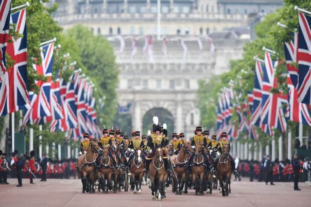 Members of The King’s Troop Royal Artillery lead the parade down the Mall back to Buckingham Palace (Photo: DANIEL LEAL/AFP via Getty Images)