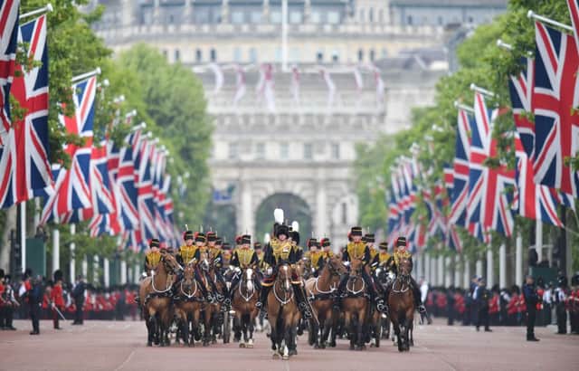Members of The King’s Troop Royal Artillery lead the parade down the Mall back to Buckingham Palace (Photo: DANIEL LEAL/AFP via Getty Images)
