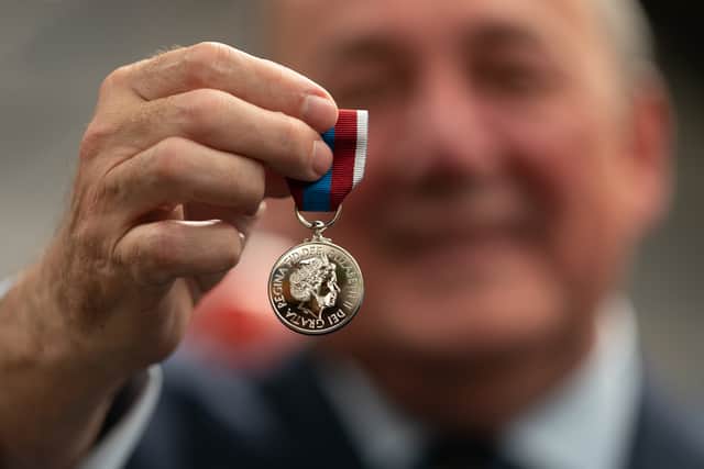 Worcestershire Medal Service chief executive Phil McDermott with the Queen’s Platinum Jubilee Medal (Photo: PA)