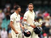 Jimmy Anderson and Stuart Broad of England walk off after the match ended in a draw on day five of the Fourth Test Match in the Ashes series between Australia and England at Sydney Cricket Ground on January 09, 2022 in Sydney