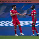 Sadio Mane of Liverpool celebrate with Mohamed Salah (Photo by Sebastian Frej/MB Media/Getty Images)