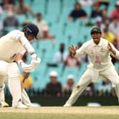 Stuart Broad of England blocks a ball during day five of the Fourth Test Match in the Ashes series between Australia and England at Sydney Cricket Ground on January 09, 2022 in Sydney, Australia