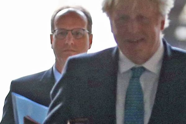 Martin Reynolds walks behind Prime Minister Boris Johnson  after a cabinet meeting in December 2020 (Photo: PA)