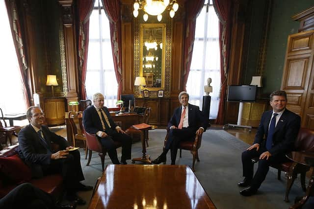 Boris Johnson (then Foreign Secretary) attends a meeting with Martin Reynolds (far left), US Secretary of State John Kerry, and US Ambassador to Britain Matthew Barzun in 2016 (Photo: KIRSTY WIGGLESWORTH/AFP via Getty Images)