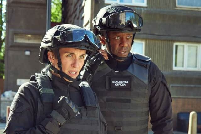 <p>Vicky McClure and Adrian Lester in Trigger Point (Credit: ITV)</p>