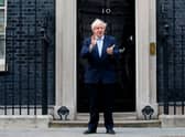 Boris Johnson was pictured clapping for key workers the day after he allegedly attended a “bring your own booze” party in Downing Street during the first lockdown (Photo: TOLGA AKMEN/AFP via Getty Images)