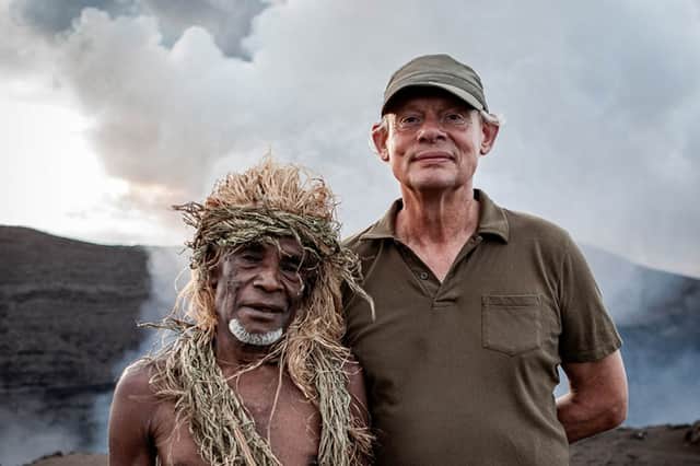 Martin Clunes at Mount Yasur with one of the native villagers (Picture: ITV)