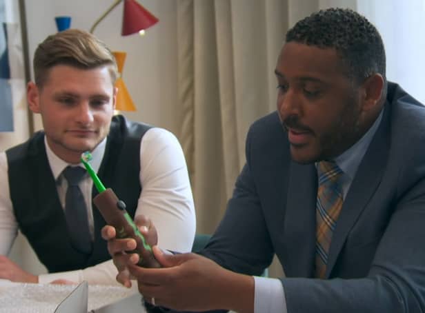 <p>The boys with their brown wand toothbrush (Photo: BBC)</p>
