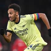 Pierre-Emerick Aubameyang of Arsenal wears an armband to show support for the Rainbow Laces campaign during the Premier League match between Manchester United  and  Arsenal at Old Trafford on December 02, 2021