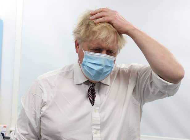 <p>Prime Minister Boris Johnson visits Finchley Memorial Hospital, a National Health Service community hospital in North London, on January 18, 2022 in London, United Kingdom.  (Getty Images)</p>
