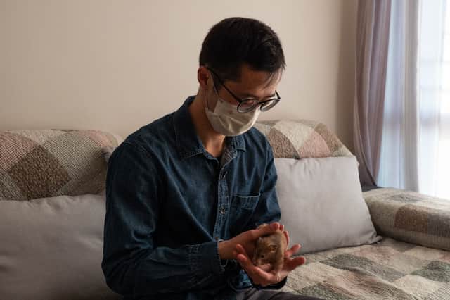 Cheung, a member of an online hamster community who has volunteered to foster abandoned small animals in light of government instructions for pet owners to give up recently purchased hamsters, chinchillas, rabbits and guinea pigs for culling