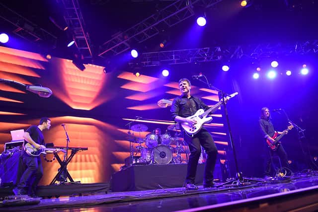 Tom Linton, Jim Adkins, Zach Lind and Rick Burc of Jimmy Eat World perform onstage in California (Photo: Emma McIntyre/Getty Images for CBS Radio)