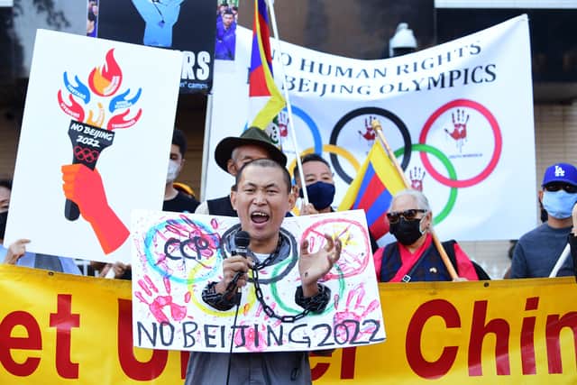 Protests have been taking place around the world ahead of the 2022 Games