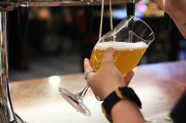 Could going to the pub for a couple of pints of 0% alcohol beer become the new normal? (image: Getty Images)