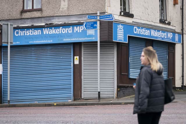 The Bury South constituency office of Christian Wakeford in Radcliffe, with its security shutters pulled down, after the MP defected from the Tories to Labour (image: PA)