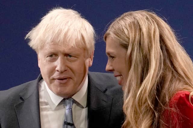 Britain’s Prime Minister Boris Johnson and wife Carrie Johnson (Photo by Christopher Furlong/Getty Images)