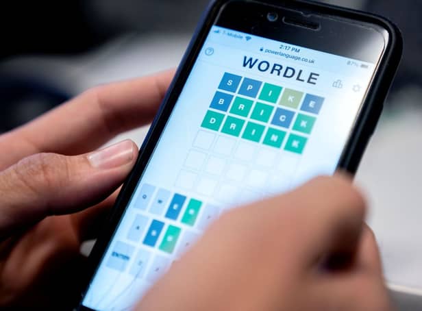 <p>The formula for ‘Wordle’ is simple, but for the past few weeks this online game has been stirring up social networks (Photo: STEFANI REYNOLDS/AFP via Getty Images)</p>