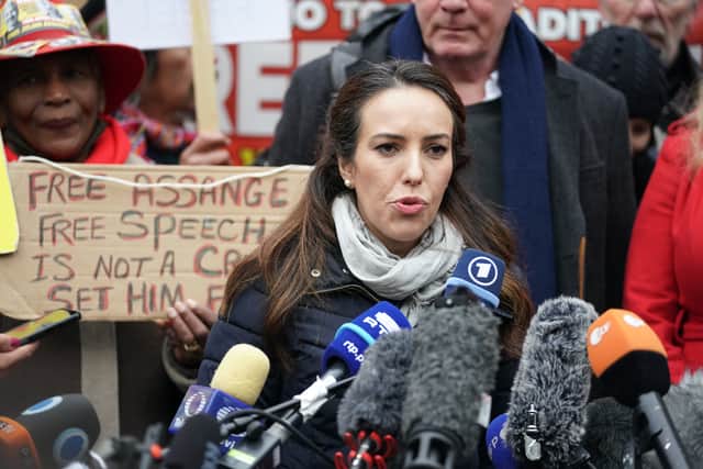 Stella Moris, the partner of Julian Assange, speaks to the media outside the Royal Courts of Justice in London.