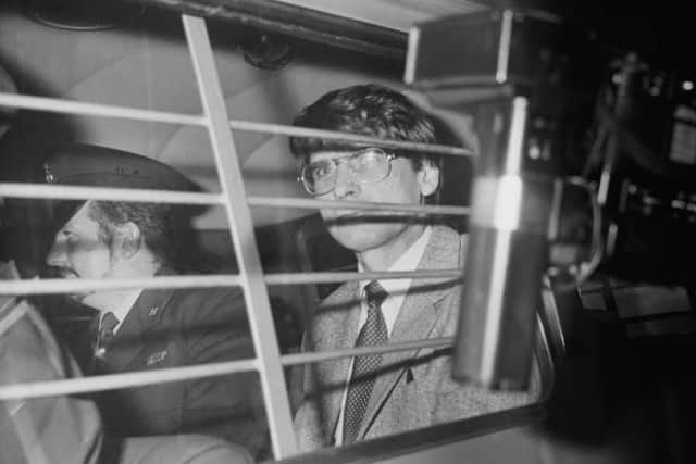 Serial killer Dennis Nilsen escorted in a police van on November 5, 1983. (Credit: Harry Dempster/Daily Express/Hulton Archive/Getty Images)