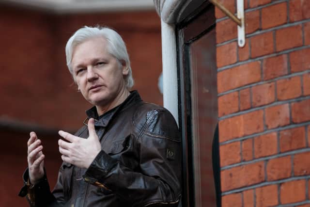 Julian Assange speaks to the media from the balcony of the Embassy Of Ecuador (Photo: Jack Taylor/Getty Images)