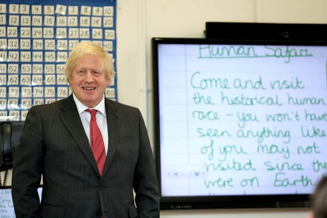 Prime Minister Boris Johnson joining a socially distanced lesson during a visit to Bovingdon Primary School in Hemel Hempstead on 19/06/2020 (image: PA) 