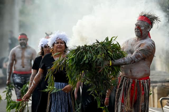 Koomurri-Bujja Bujja dancers arrive for the smoking ceremony during the WugulOra Morning Ceremony as part of Australia Day 2022 (Photo: Bianca De Marchi - Pool/Getty Images)
