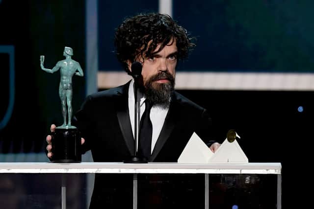 Peter Dinklage accepting Outstanding Performance by a Male Actor in a Drama Series for Game of Thrones (Photo: Kevork Djansezian/Getty Images for Turner)