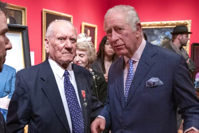 The Prince of Wales meets Holocaust survivor Arek Hersh as he attends an exhibition at The Queen’s Gallery, Buckingham Palace (image: PA)