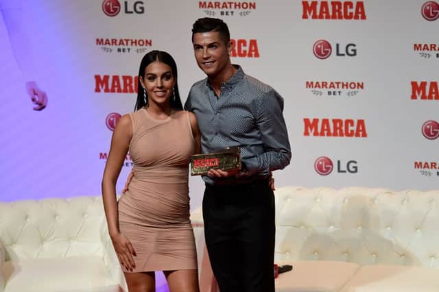 Cristiano Ronaldo and Georgina Rodriguez posing after Ronaldo received the MARCA Leyenda (MARCA Legend) award in Madrid (Photo: JAVIER SORIANO/AFP via Getty Images)